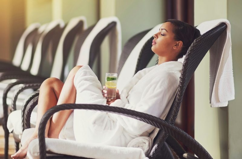 woman sitting at hotel spa