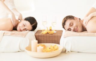 couples massage with candles